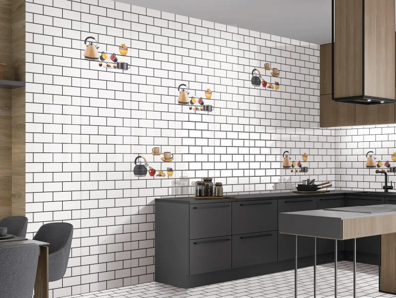 Minimalist L shape kitchen design with white subway tiles, tea kettle decor, and dark cabinets.